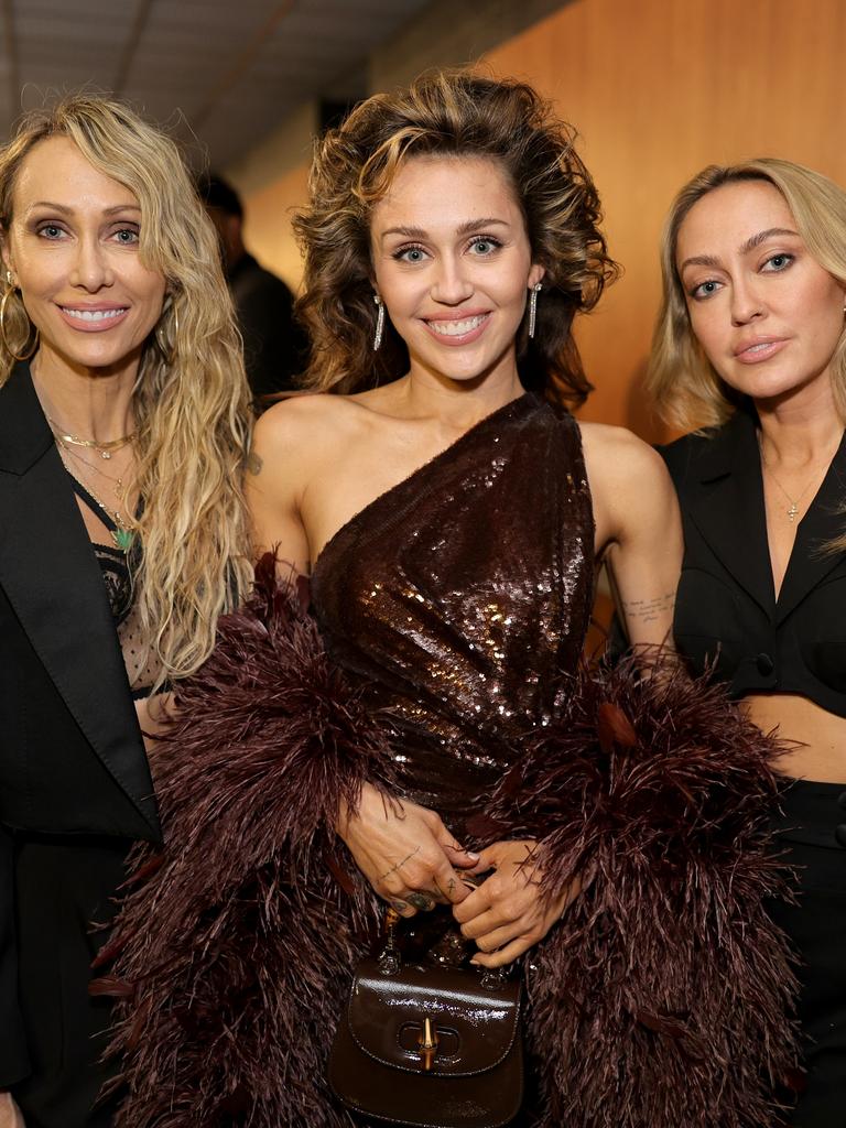 Miley, Tish and Brandi have remained close. Picture: Neilson Barnard/Getty Images for The Recording Academy