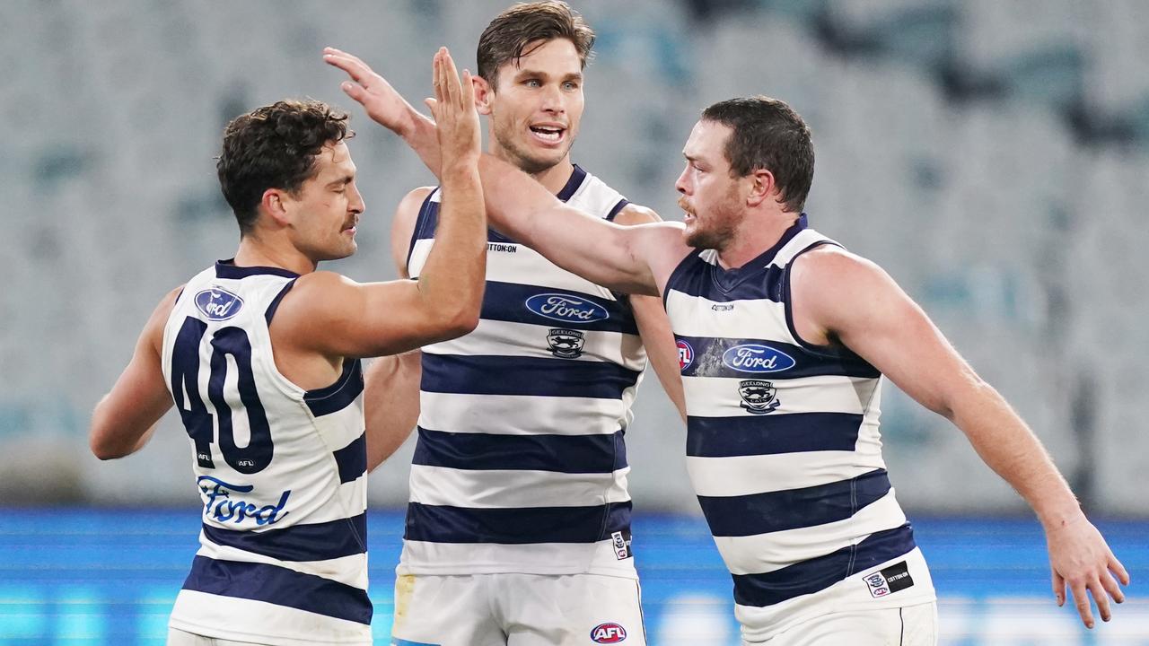The Cats hung on against the Dees... just (AAP Image/Michael Dodge).