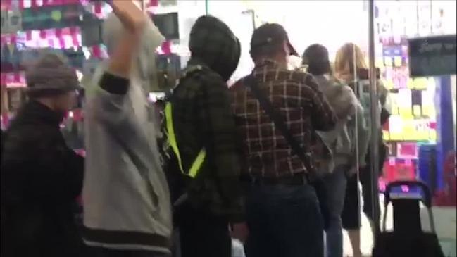 Frenzied shoppers line up outside chemist in CBD to stock up on baby formula before tins even hit shelves.