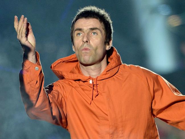 In this photograph released by One Love Manchester on June 4, 2017, UK musician Liam Gallagher performs at the One Love Manchester benefit concert for the families of the victims of the May 22, Manchester terror attack, at Emirates Old Trafford in Greater Manchester on June 4, 2017.  / AFP PHOTO / One Love Manchester / Dave Hogan for One Love Manchester / RESTRICTED TO EDITORIAL USE - MANDATORY CREDIT "AFP PHOTO / ONE LOVE MANCHESTER / DAVE HOGAN" - NO MARKETING NO ADVERTISING CAMPAIGNS - DISTRIBUTED AS A SERVICE TO CLIENTS