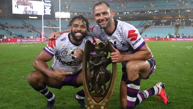 Josh Addo-Carr and Storm captain Cameron Smith wih the NRL premiership trophy after last week’s grand final win.(Photo by Cameron Spencer/Getty Images)