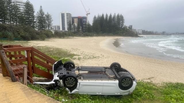 Car rolled onto Snapper Rocks beach in Coolangatta. Photo: Friends of Rainbow Bay Society/Facebook