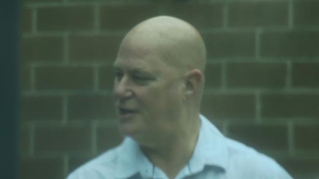 Michael Leslie Wilmot, 59, of Lake Haven, arriving at Wyong Local Court where he pleaded guilty to using a carriage service to groom a child for sex and masturbating on a video call. Picture: NewsLocal