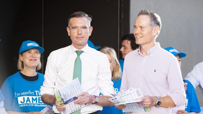 Outgoing premier Dominic Perrottet and Tim James pictured on the campaign trail.