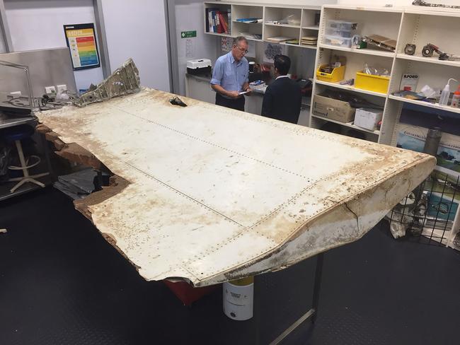 A large piece of debris found in Tanzania recently which has been confirmed as a part of a wing flap from missing Malaysia Airlines passenger jet MH370. Picture: AFP/ATSB