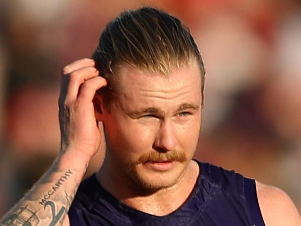 SYDNEY, AUSTRALIA - AUGUST 12: Cam McCarthy of the Dockers and Matt Taberner of the Dockers look dejected after losing the round 21 AFL match between the Sydney Swans and the Fremantle Dockers at Sydney Cricket Ground on August 12, 2017 in Sydney, Australia.  (Photo by Cameron Spencer/Getty Images)