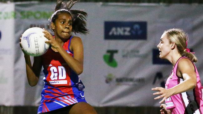 Sharks' Rhyanna Yow-Yeh flies high in the 2019 Cairns Netball division one grand final match against Leprechauns. PICTURE: BRENDAN RADKE