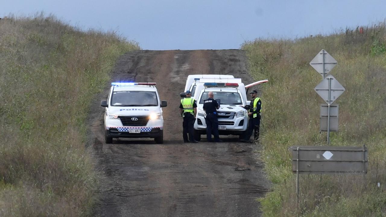 FLOOD TRAGEDY: Police officers cordon off Brimblecombe Rd in Kingsthorpe, near where a man and multiple dogs were killed in floodwaters early on Monday morning.