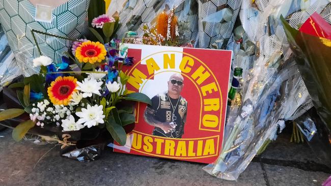 Flowers at the scene of the killing of Canberra Comanchero boss Pitasoni Ulavalu. Picture: Craig Dunlop