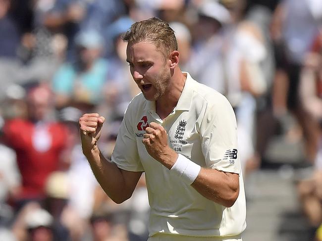 England's Stuart Broad celebrates taking the wicket of Australia's Usman Khawaja during their Ashes cricket test match in Melbourne, Australia, Tuesday, Dec. 26, 2017. (AP Photo/Andy Brownbill)