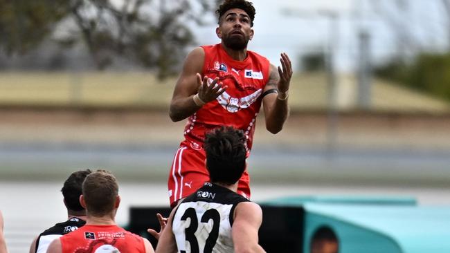 North Adelaide's Nigel Lockyer Jnr flies high against Port Adelaide in the Roosters’ massive 126-point win at Prospect Oval. Picture: Scott Starkey (SANFL).