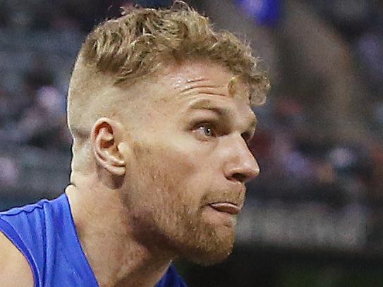 AFL Round 14. Western Bulldogs vs North Melbourne at the Etihad Stadium.  Western Bulldogs Jake Stringer kicks the winning point with 40 secs to go  . Pic: Michael Klein