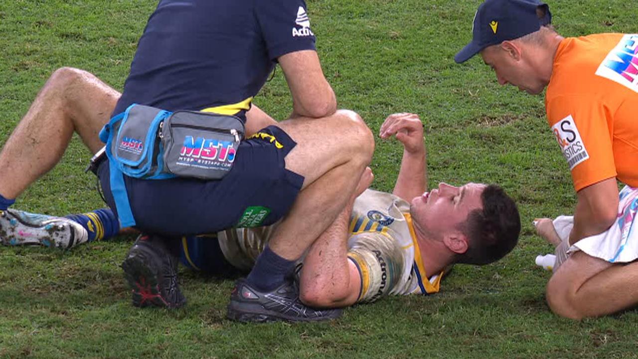 Mitchell Moses stays down after a head knock.