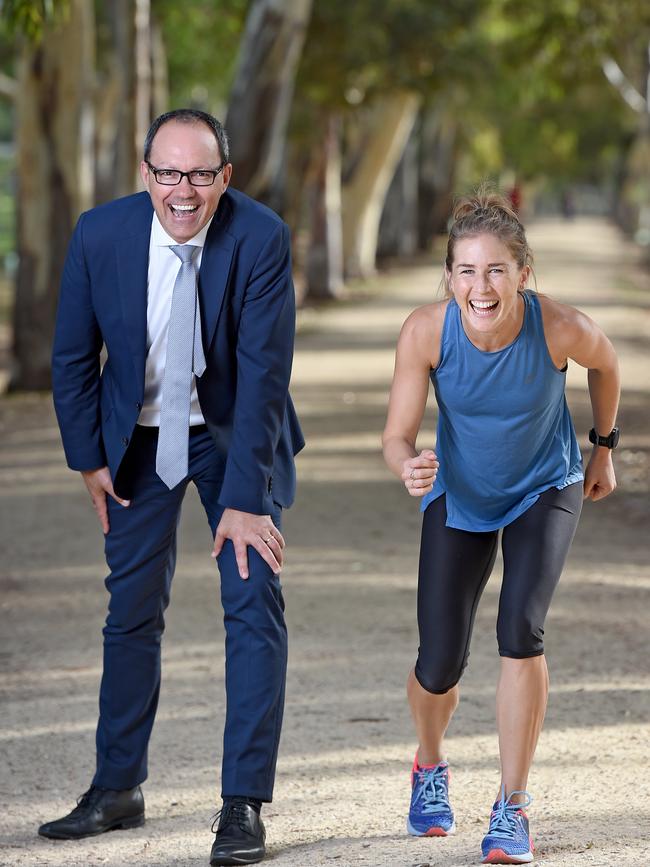 Sports Minister Corey Wingard with Adelaide marathon star Jess Trengove. Picture: Naomi Jellicoe