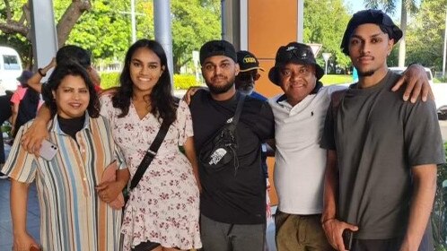 Sisira (second from right) and Themiya Gajanayake (right) with their family, hours before their tragic drowning at Crystal Cascades. Picture: Supplied