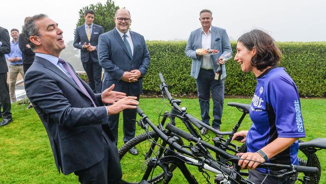 Premier Steven Marshall with Deborah Fehler from Escape Goat at the round-three voucher launch, as SA Tourism CEO Rodney Harrex and Michael Errey from The Glass Half Full Tours at Mt Lofty House watch. Picture: Brenton Edwards