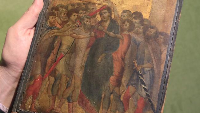 The 13th-century Cimabue painting was discovered in an elderly French woman's kitchen earlier this year. Picture: AP/Michel Euler