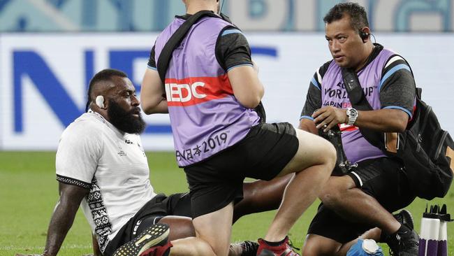 Fiji's Peceli Yato receives treatment during the clash with Australia. Picture: AP