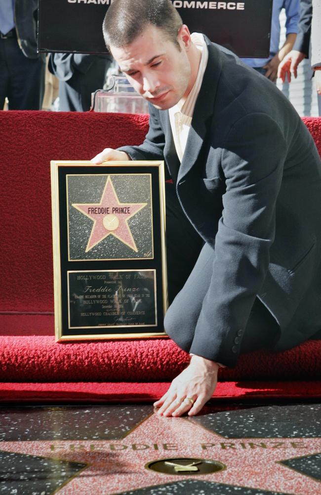 The actor touches the star dedicated to his late father, comedian Freddie Prinze.