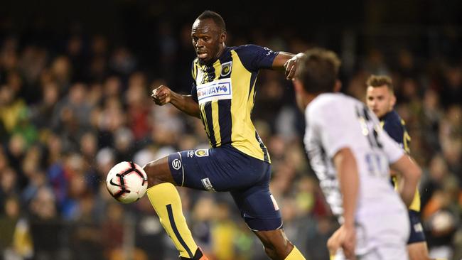 Usain Bolt in action for Central Coast Mariners against Macarthur South West United earlier this month. Picture: AFP