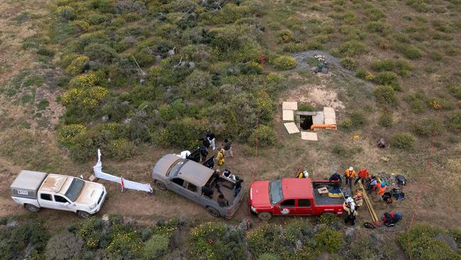 The three bodies were found 15m down the well. Picture: Guillermo Arias/ AFP