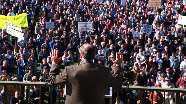 No image better captured Prime Minister John Howard’s commitment to overhauling Australia’s gun laws in the wake of the Port Arthur Massacre than this 1996 photo of him wearing a bulletproof vest under his suit, as he addressed a hostile pro-gun rally in rural Sale. The strict gun laws he pushed through in Australia became some of the toughest in the world.