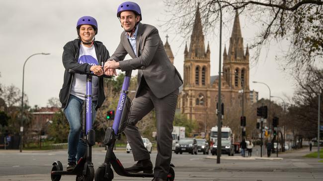 Nicole Ricciardi with Beam ANZ Head of Operations Locky Cooper – e-scooters will be expanded to Norwood but the operators are not yet decided. Picture: Brad Fleet