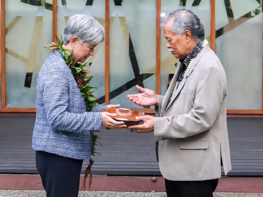 Australian Foreign Minister Penny Wong exchanges gifts with Henry Puna, the Secretary-general of the Pacific Island Forum in Suva, Fiji. Wong is on her first solo overseas trip since becoming Foreign Minister. (Photo by Pita Simpson/Getty Images)