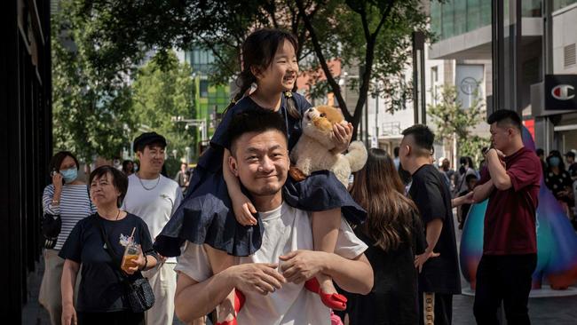 For years, rising numbers of young Chinese people have complained that parenthood is financially impossible. Picture: AFP