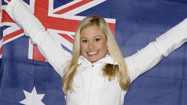 Olympian Alisa Camplin with the Australian flag after her gold medal triumph in Salt Lake City.