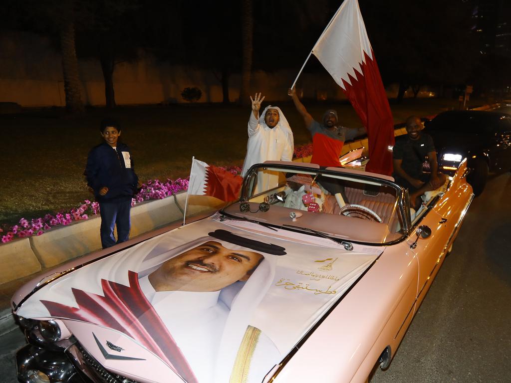 Qatari fans celebrate after their national team defeated UAE to qualify to the final of the 2019 AFC Asian Cup. Picture: AFP