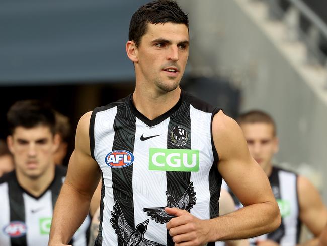 ADELAIDE, AUSTRALIA - JUNE 05: Scott Pendlebury of the Magpies leads his team out during the 2021 AFL Round 12 match between the Adelaide Crows and the Collingwood Magpies at Adelaide Oval on June 5, 2021 in Adelaide, Australia. (Photo by James Elsby/AFL Photos via Getty Images)