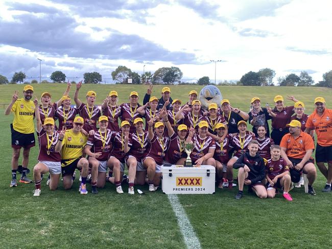 Kawana Dolphins celebrate winning the 2024 open women's Sunshine Coast rugby league grand final.