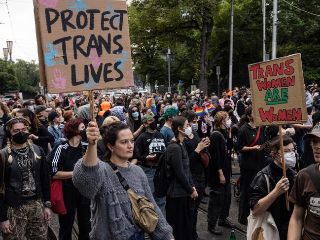 Pro-trans activists gather along Spring Street. Picture: NewsWire / Diego Fedele