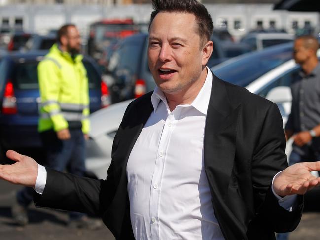 Tesla CEO Elon Musk gestures as he arrives to visit the construction site of the future US electric car giant Tesla, on September 03, 2020 in Gruenheide near Berlin. - Tesla builds a compound at the site in Gruenheide in Brandenburg for its first European "Gigafactory" near Berlin. (Photo by Odd ANDERSEN / AFP)