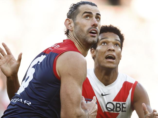 MELBOURNE, AUSTRALIA - APRIL 02: Joel Amartey of the Swans and Brodie Grundy of the Demons contest the ruck during the round three AFL match between Melbourne Demons and Sydney Swans at Melbourne Cricket Ground, on April 02, 2023, in Melbourne, Australia. (Photo by Daniel Pockett/Getty Images)