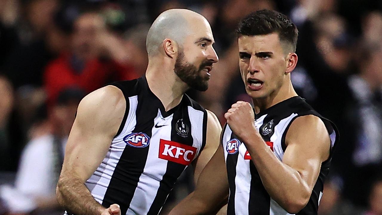 Nick Daicos celebrates kicking a goal as the contest tightens up. Picture: Mark Kolbe/AFL Photos/via Getty Images