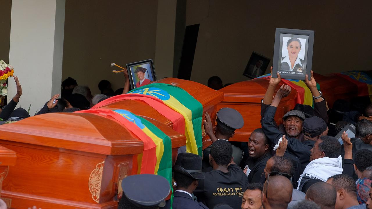 Mourners and family members escort the coffins of the Ethiopian passengers and crew who died in the Ethiopian Airlines crash. Picture: Jemal Countess/Getty Images.
