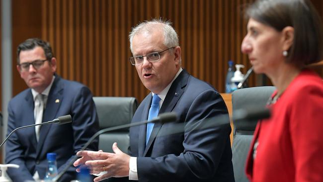 Daniel Andrews, Scott Morrison and Gladys Berejiklian at a national cabinet meeting in Canberra last December. Picture: Getty Images