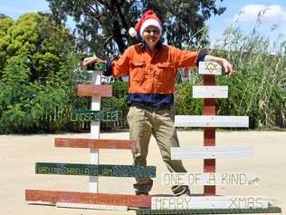 Christie Green is creating hand-made Christmas trees that she is donating to families in need this Christmas. Picture: Ellen Ransley