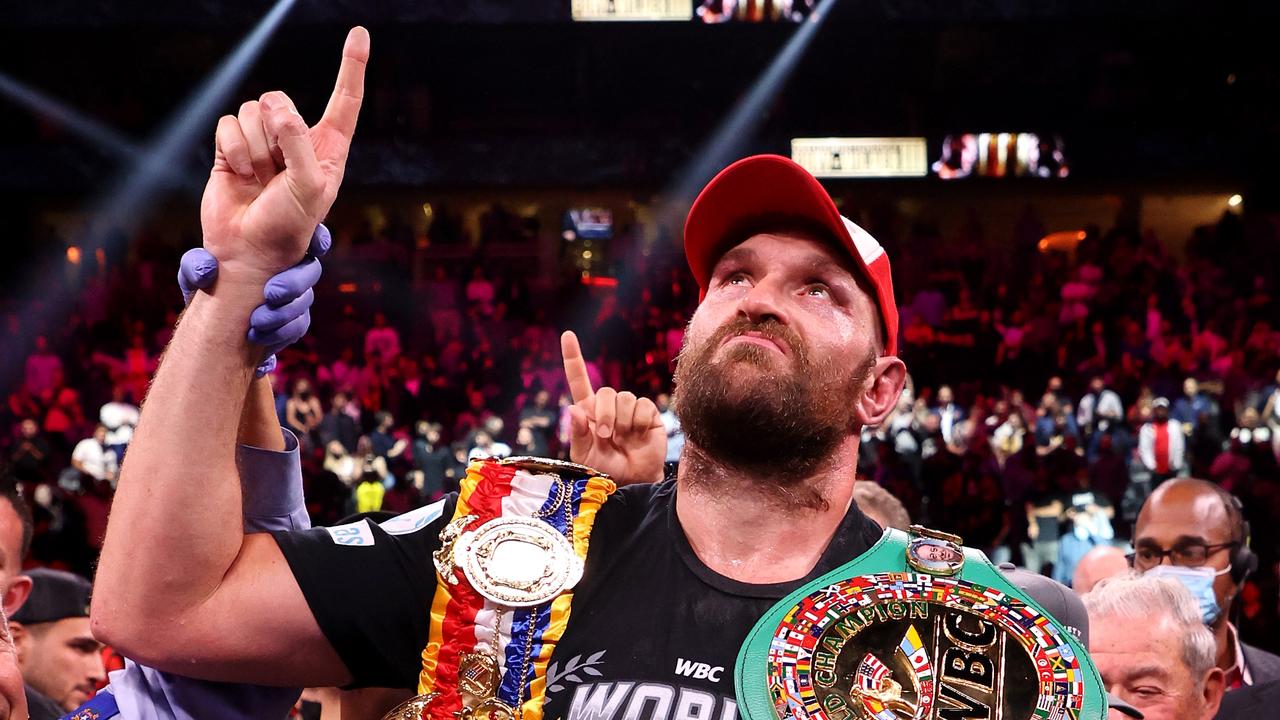 LAS VEGAS, NEVADA - OCTOBER 09: Tyson Fury celebrates his 11th round knock out win against Deontay Wilder after their WBC heavyweight title fight at T-Mobile Arena on October 09, 2021 in Las Vegas, Nevada. (Photo by Al Bello/Getty Images)