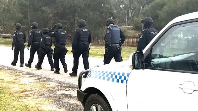 Two men have been charged in the state’s south following a series of police searches as part of Strike Force Kilnyana.