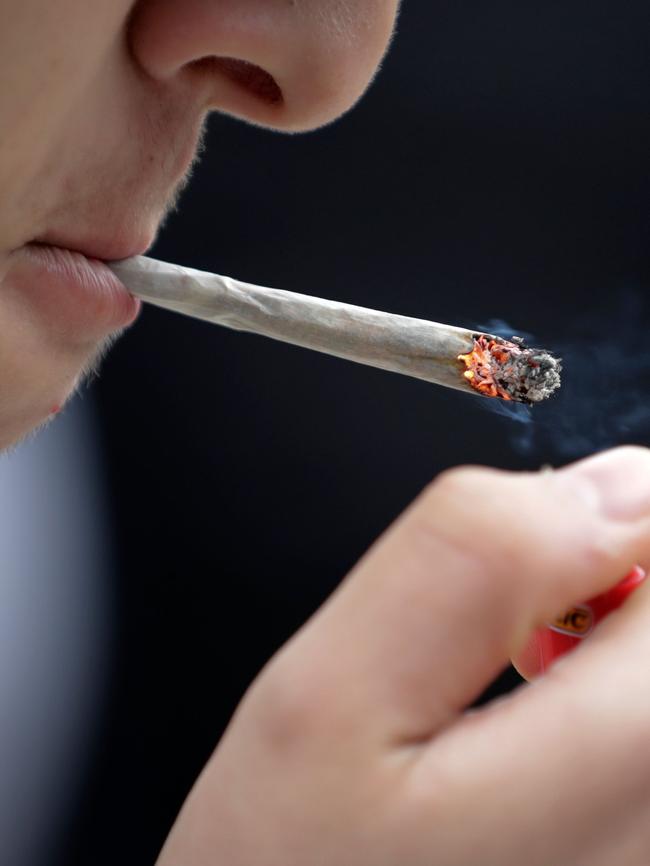 A generic picture of a man lighting up a cigarette. Picture: Thomas Samson