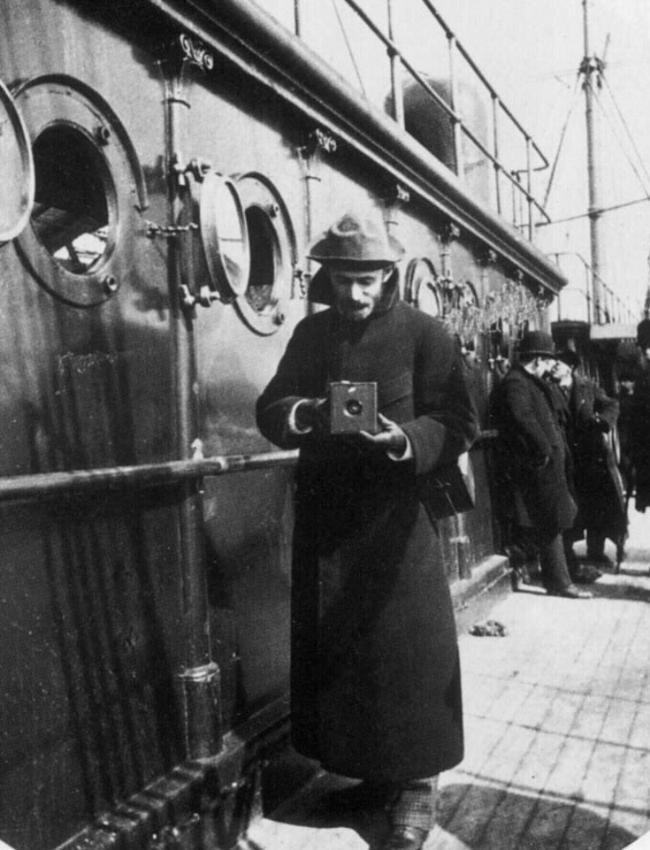 Eastman holding the box camera during an Atlantic crossing in 1890.