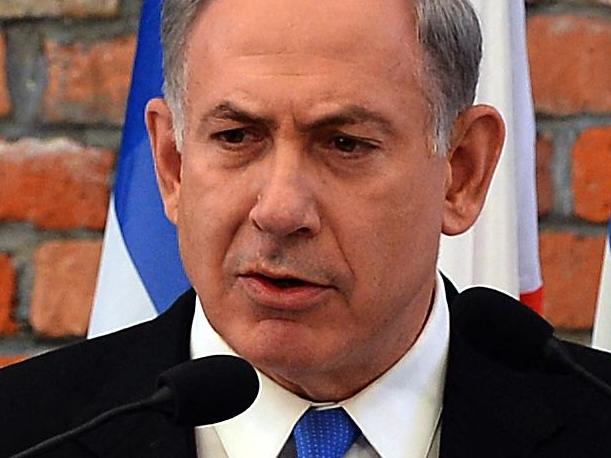 (FILES) Israeli Prime Minister Benjamin Netanyahu delivers a speech during the opening of the Permanent Exhibition SHOAH at the former Nazi death camp Auschwitz-Birkenau State Museum, Block 27 in Oswiecim, Poland, on June 13, 2013. Poland's government said on January 10, 2025 it would grant free access to Israeli officials wanting to attend the 80th anniversary of the Auschwitz-Birkenau liberation despite an arrest warrant issued for the Israeli Prime Minister Benjamin Netanyahu. (Photo by JANEK SKARZYNSKI / AFP)