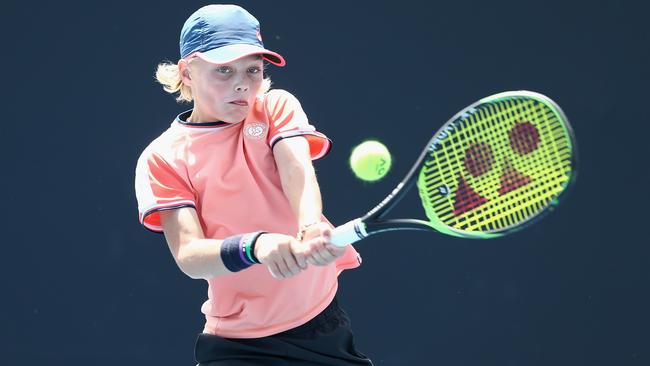 Cruz plays a backhand in the Under-12s Australian Championships during the Australian Open. Picture: Rob Prezioso