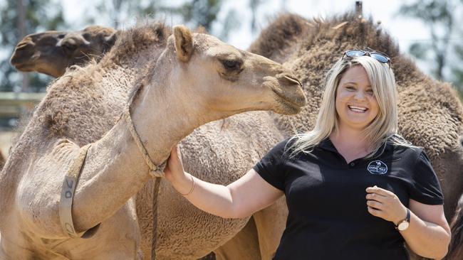 Megan Williams with her camels.