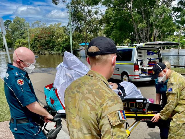 The army assists an aged-care evacuation at Yeronga. Picture: Queensland Ambulance Service