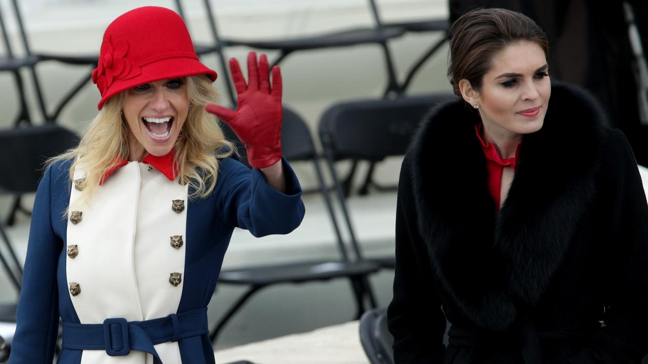 Trump advisers Kellyanne Conway, left, and Hope Hicks, right, on the West Front of the US Capitol on January 20, 2017 in Washington, DC, on the day of Trump’s inauguration ceremony. Picture: Getty