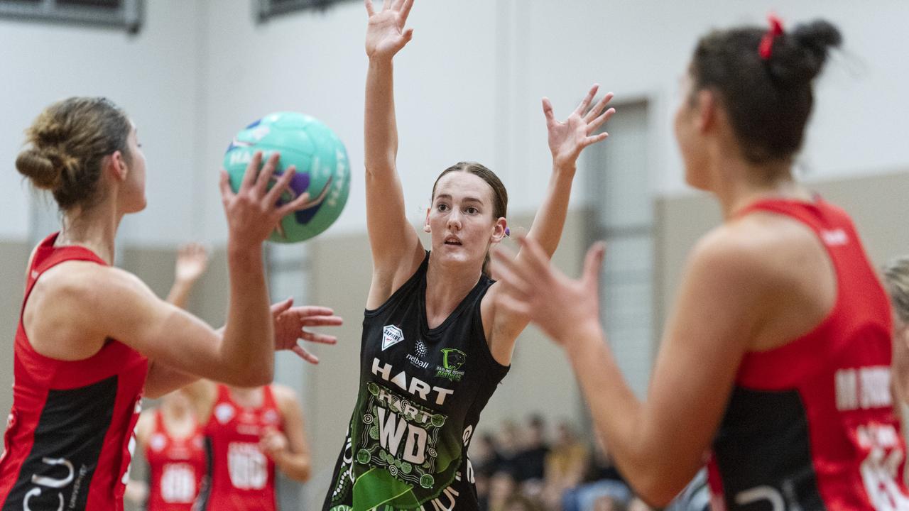 Molly Gore (centre) defends for Darling Downs Panthers against ACU Brisbane North Cougars. Picture: Kevin Farmer